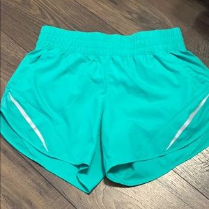 green athletic shorts
